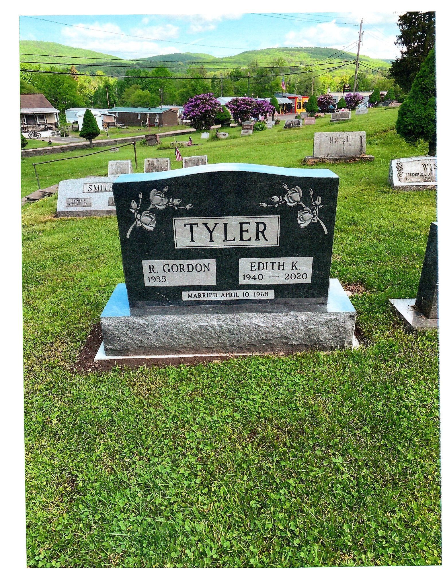 Gravestone in a cemetery, inscribed 