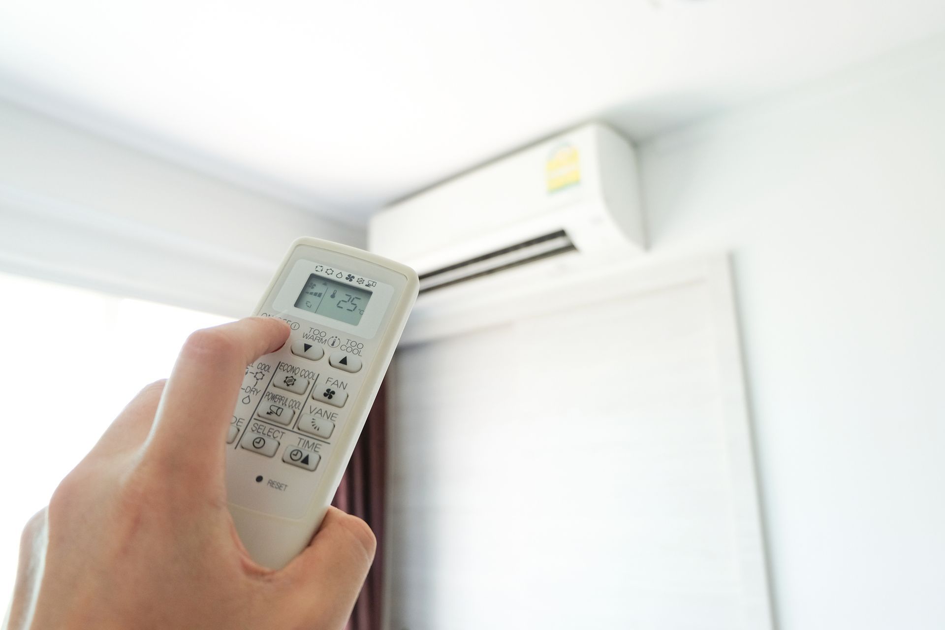 Woman Adjusting Air Purifier | Glasgow, VA | Natural Bridge