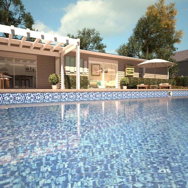 Une maison avec une piscine devant