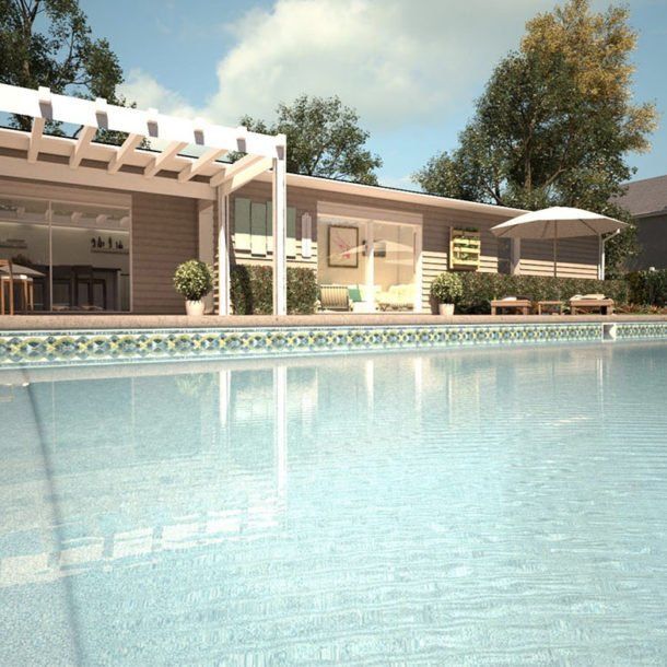 Une maison avec une grande piscine devant