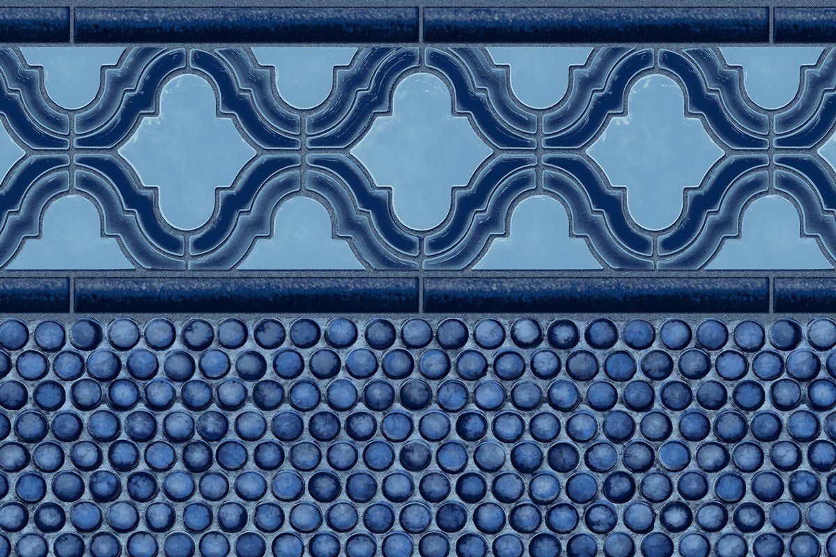 Un gros plan d un carreau bleu avec un motif dessus.