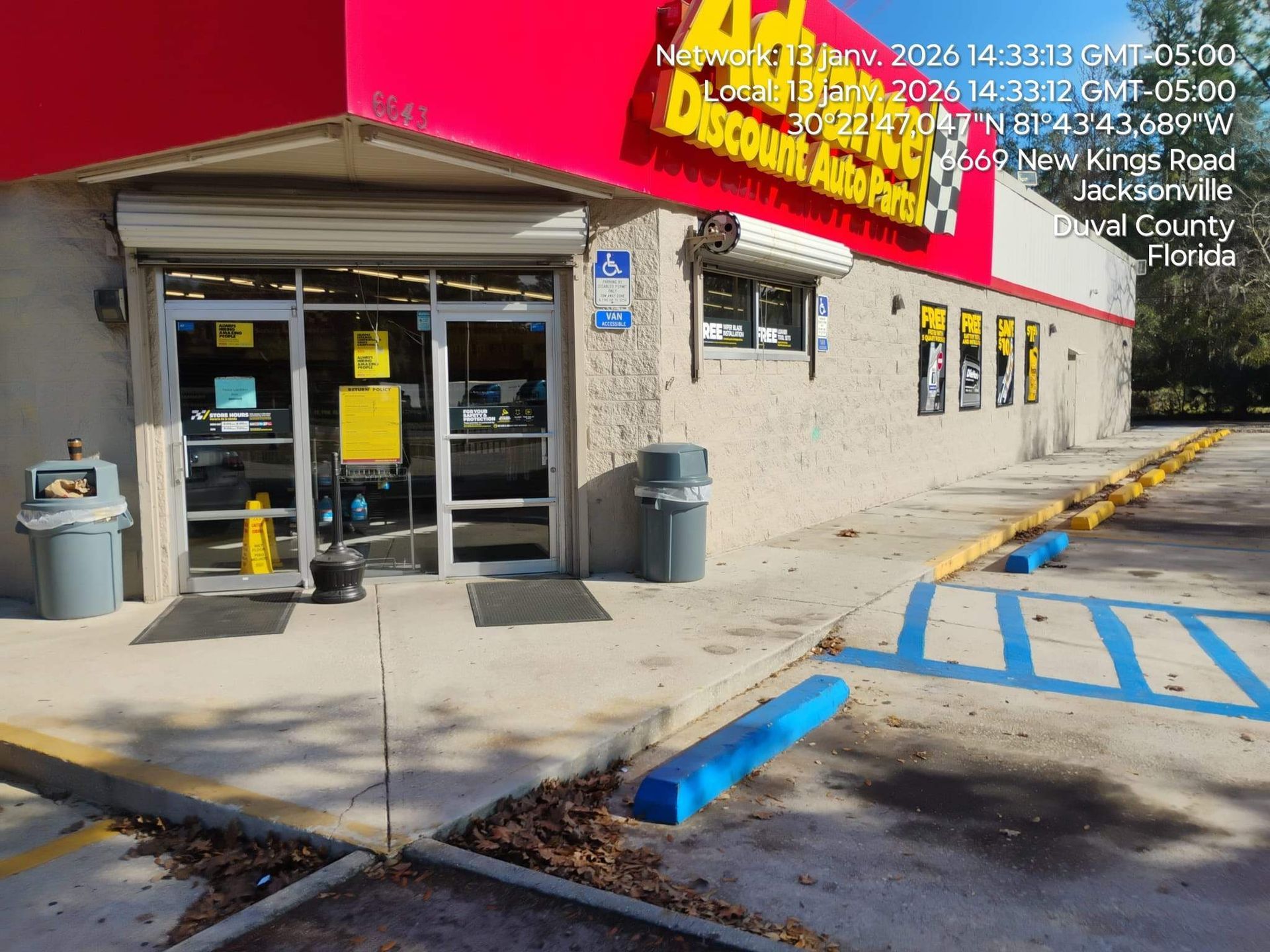 Exterior of an Advance Auto Parts store in Jacksonville, FL. Red and yellow sign, accessible entrance.