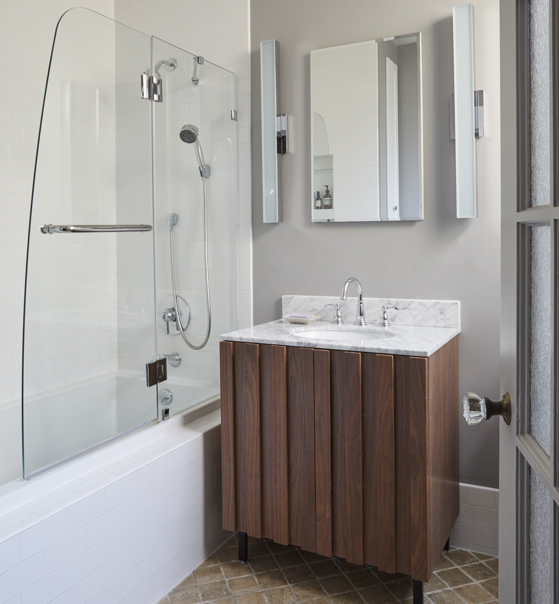 A bathroom with a sink and a bathtub