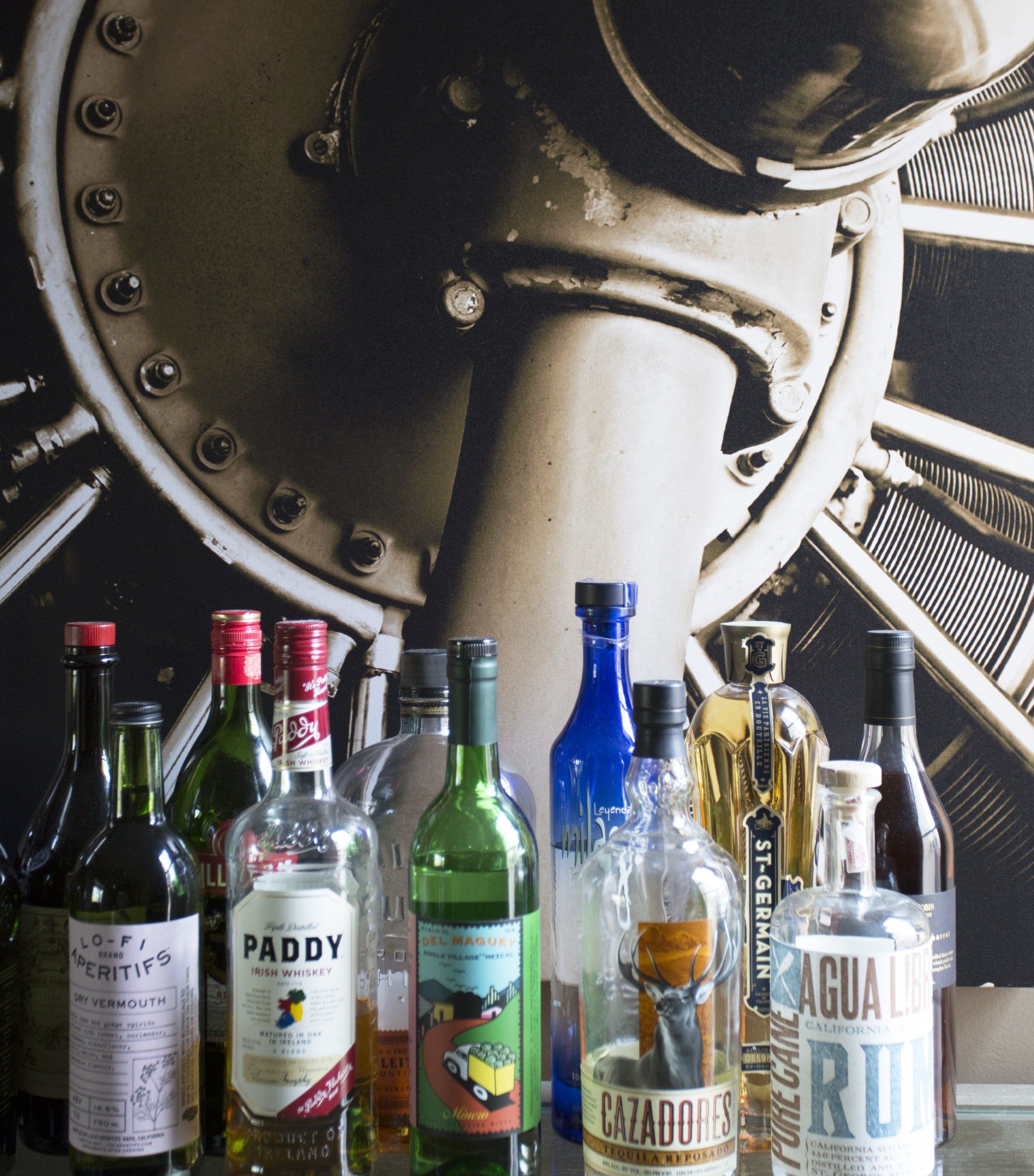 Several bottles of liquor including paddy and aquarius