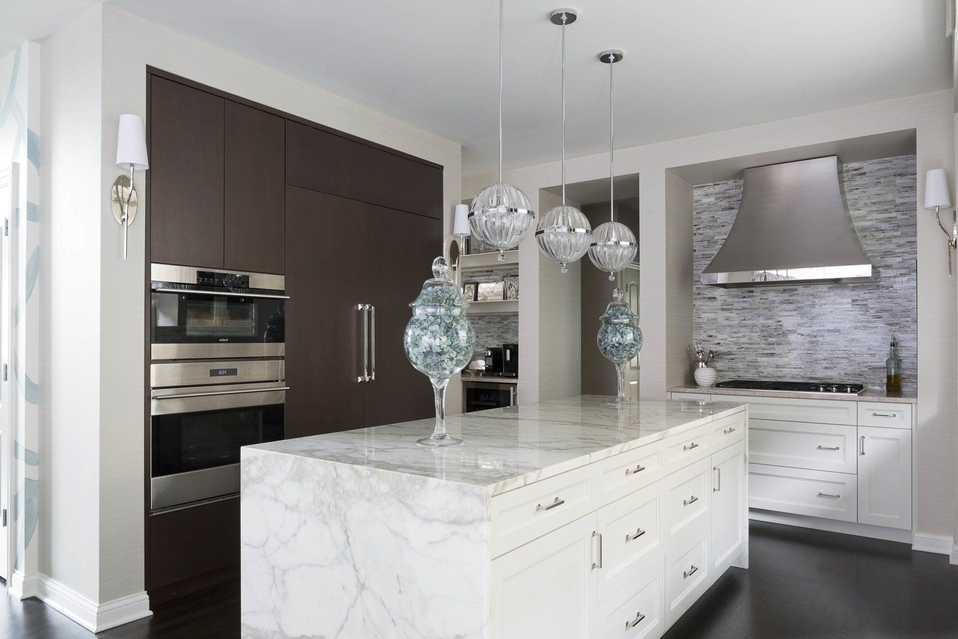 There is a large island in the middle of the kitchen.