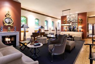 A living room filled with furniture and a fireplace.