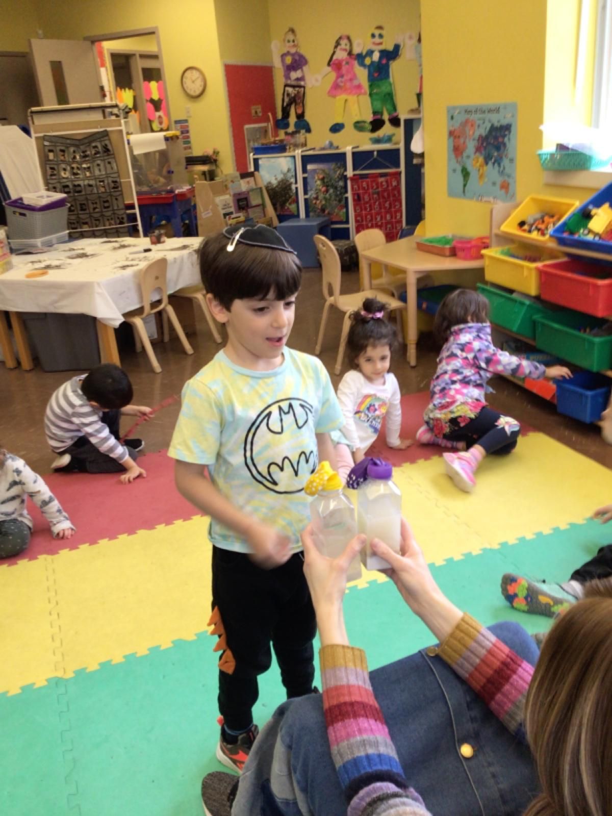 A child is doing an experiment