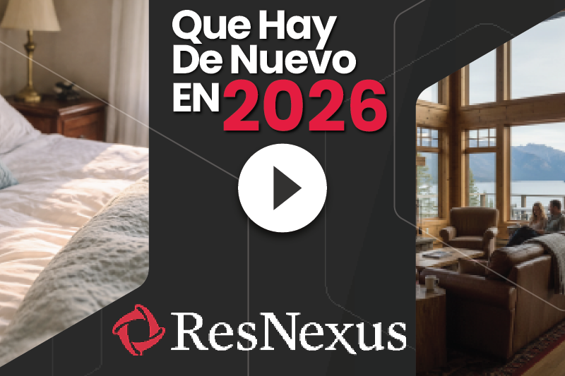 A man is standing in front of a video of a woman pointing at a credit card.