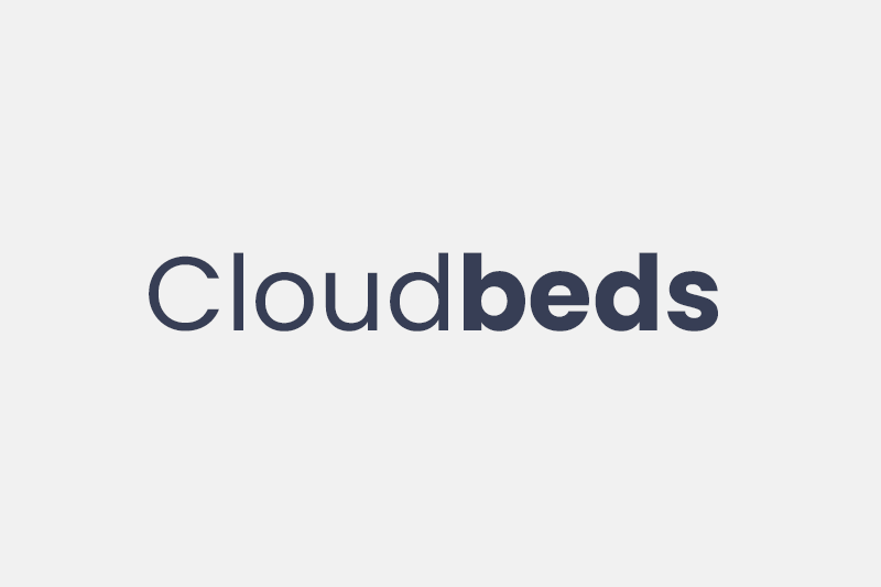 The logo for cloudbeds is on a white background.