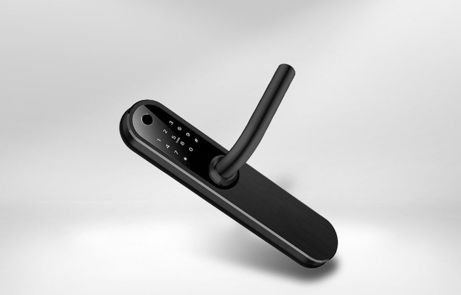 A laptop computer is sitting on a table with a blue background.