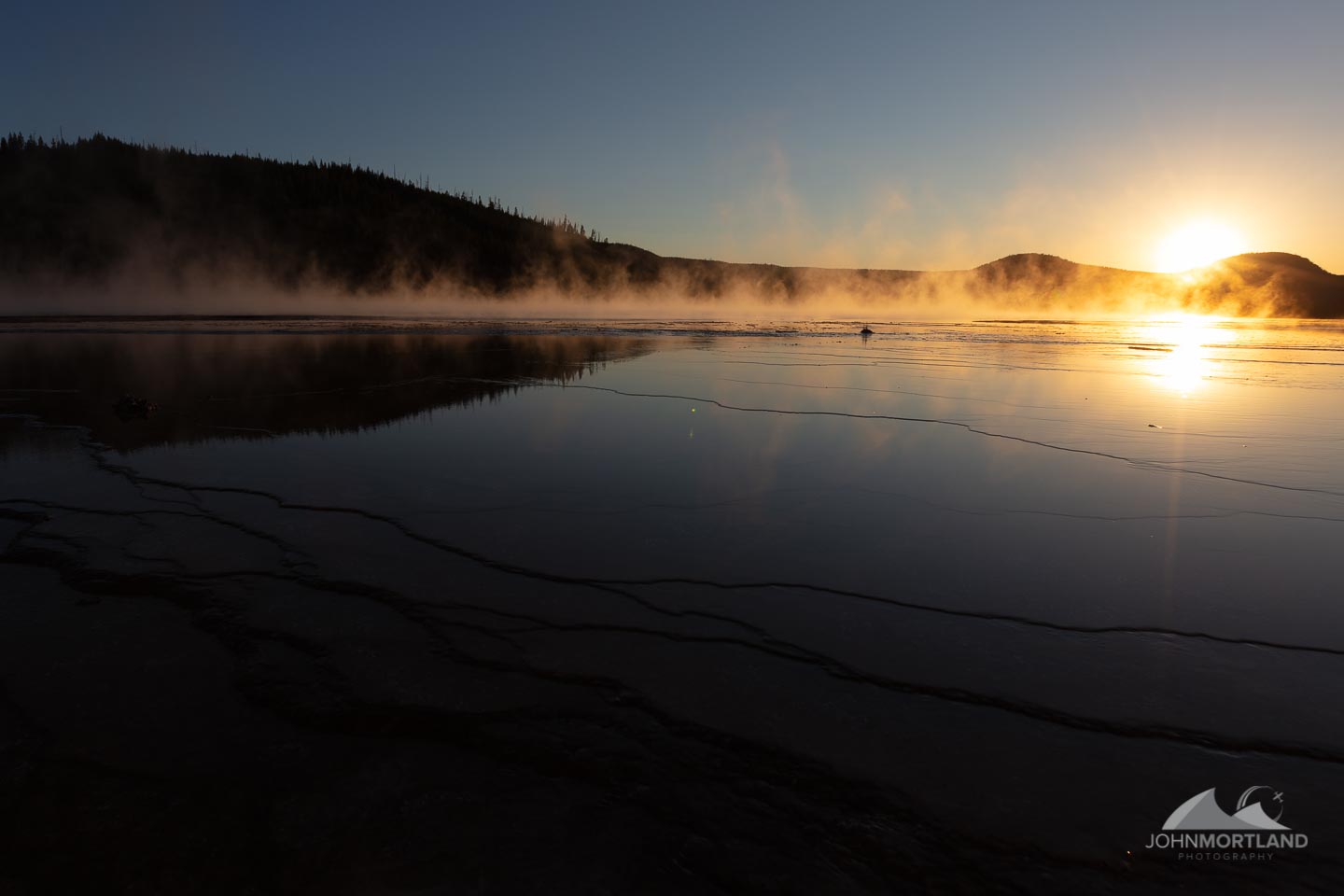 Misty Sunrise over lake in Colorado