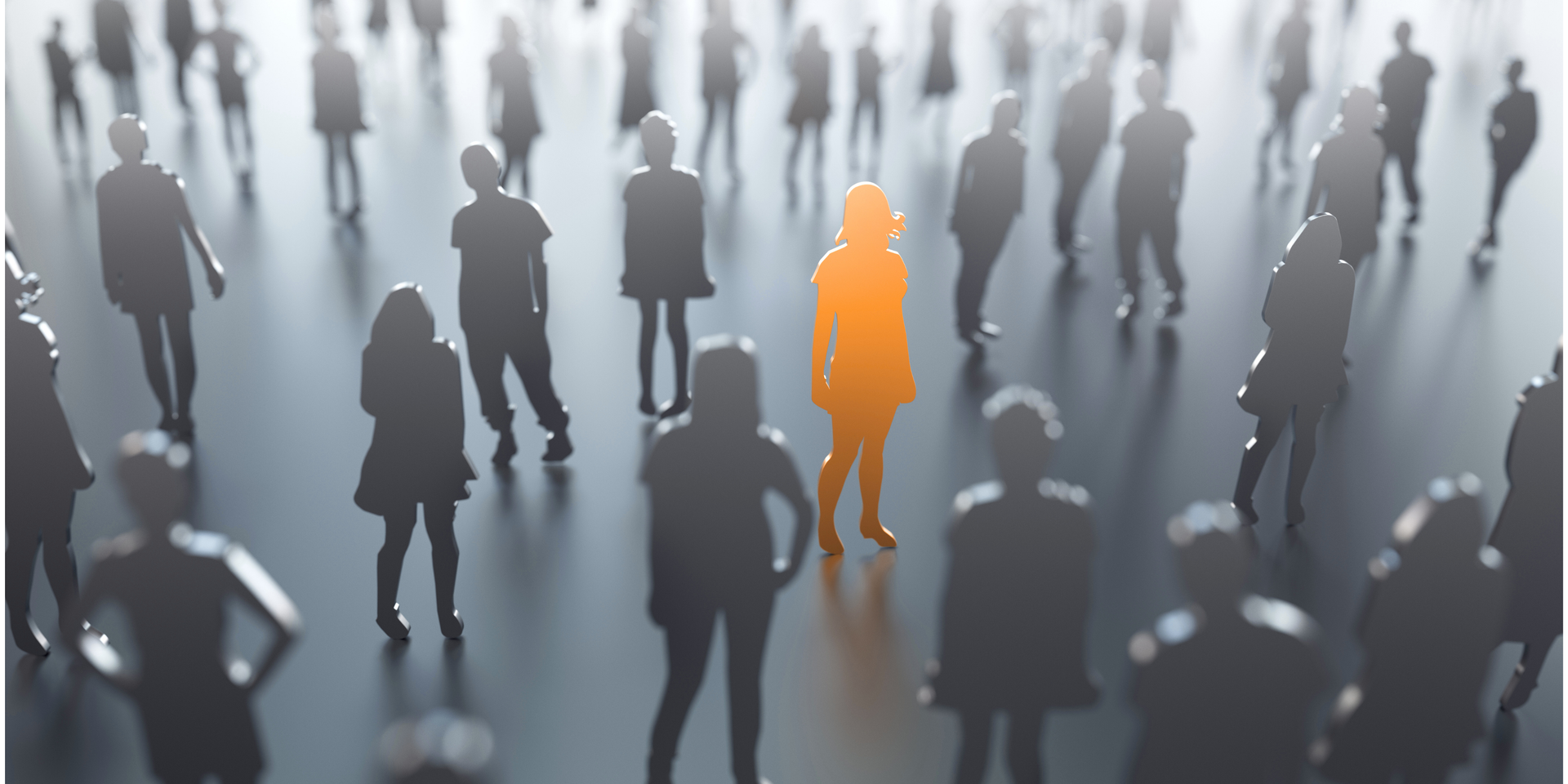 Orange figure stands out in a crowd of gray silhouettes.