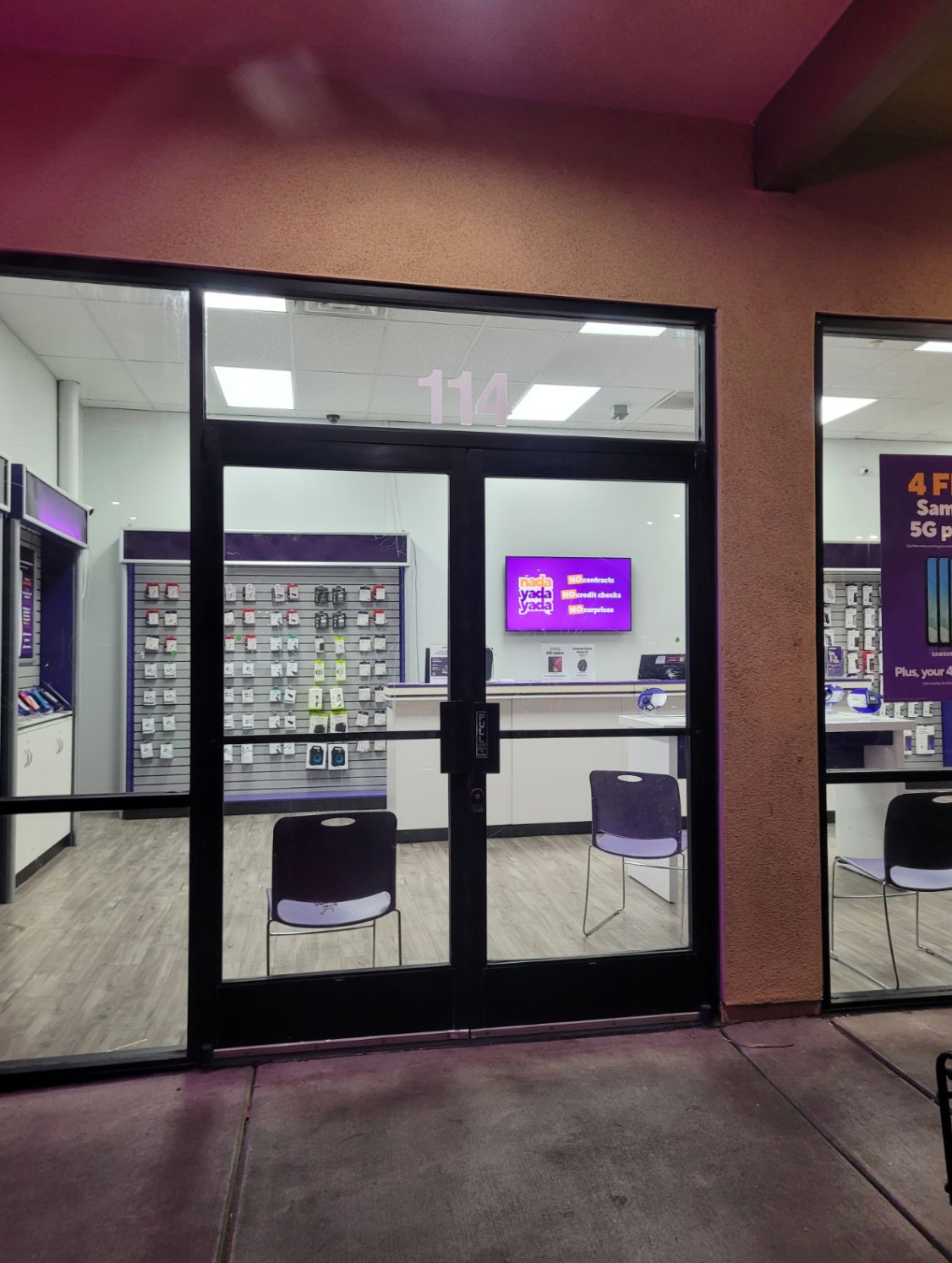 A store front with the number 114 on it