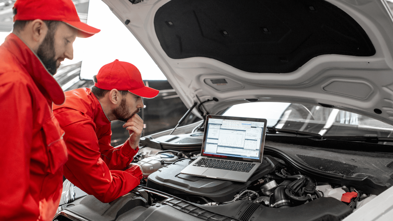two mechanics doing a diagnostic evaluation