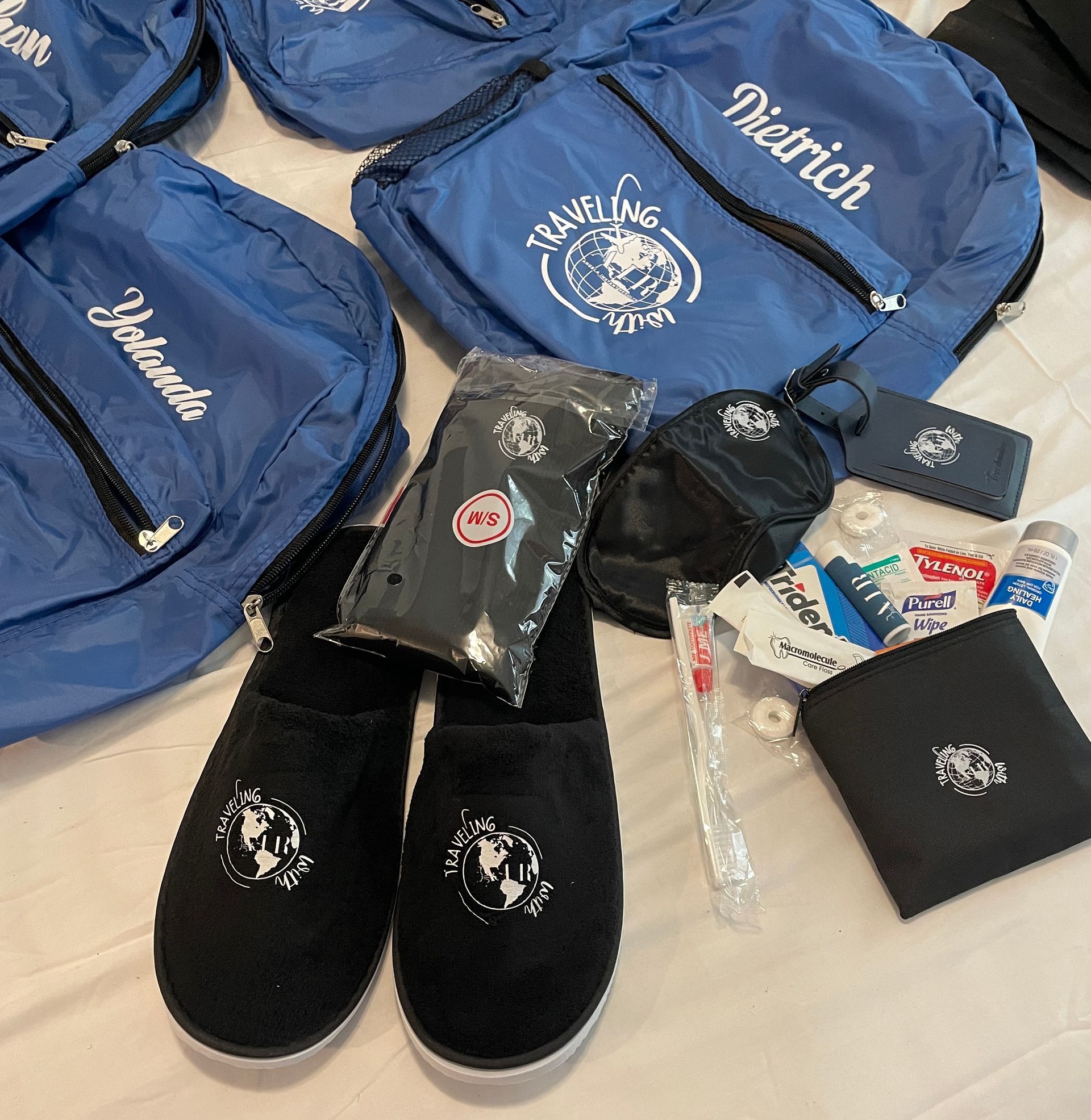 A blue backpack with the name patrich on it
