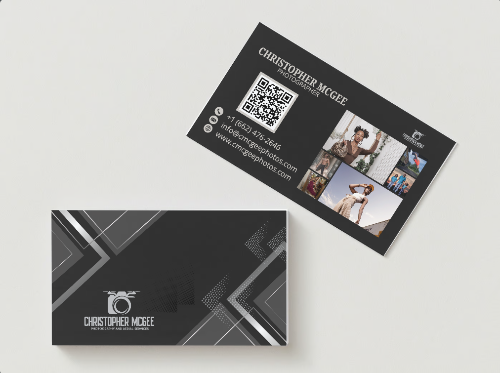 A black business card with a qr code on it
