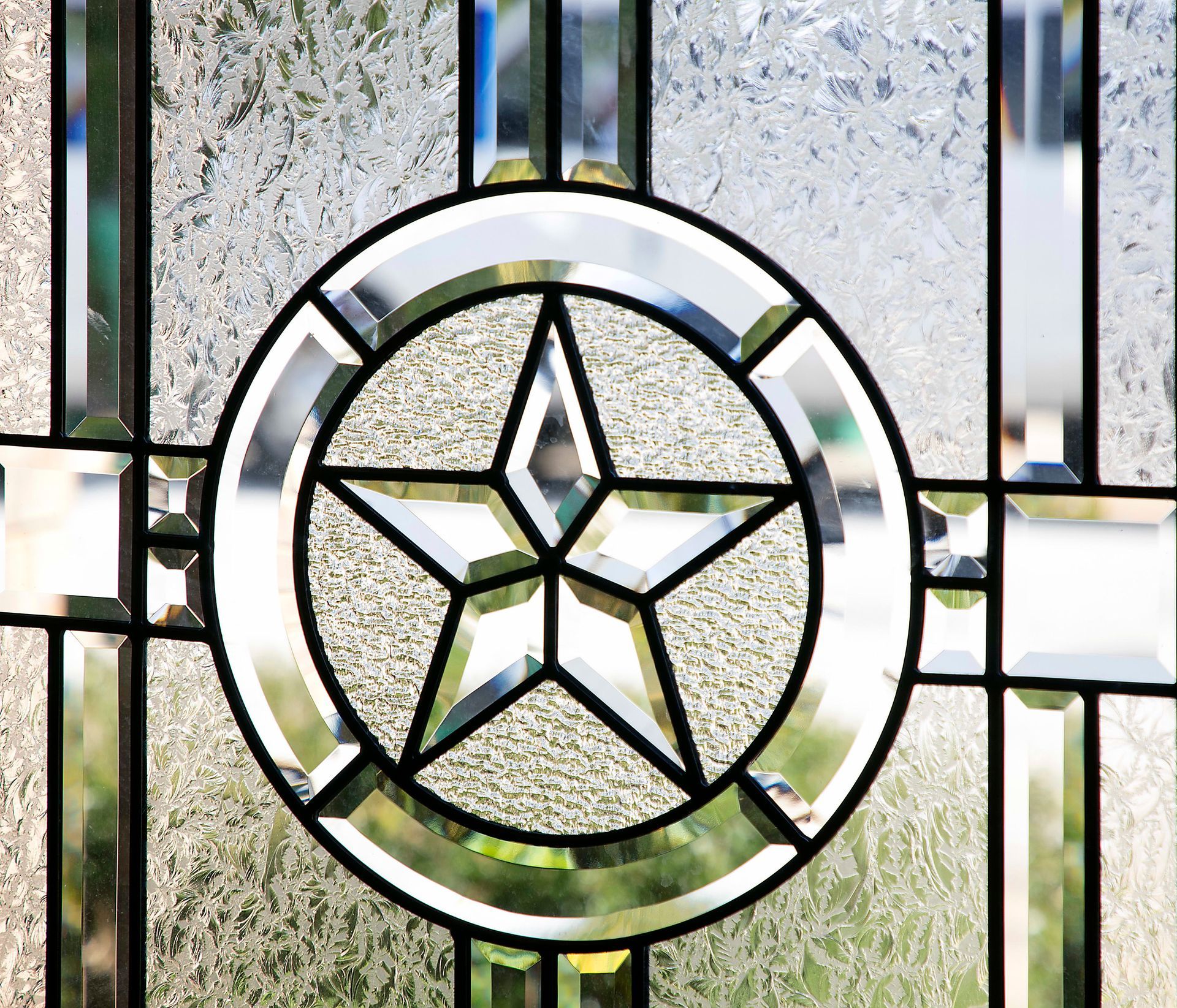 A stained glass window with a star in the center