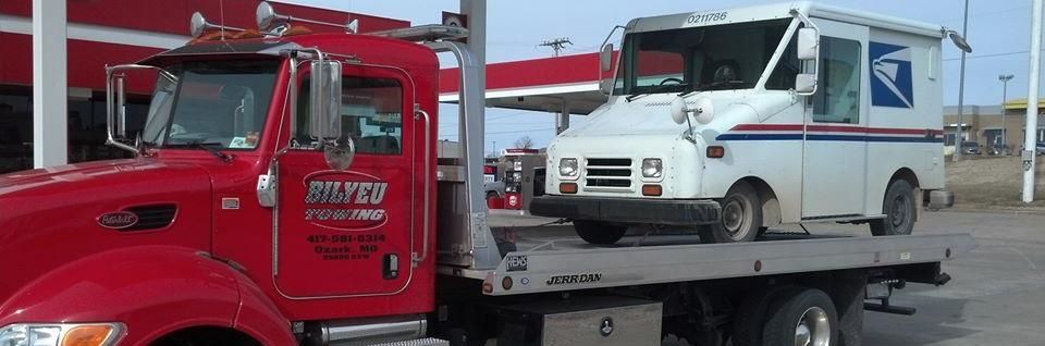 mail truck being towed