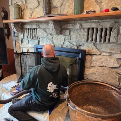 Man Cleaning The Brick Chimney — Columbus, OH — Pro Sweep Chimney