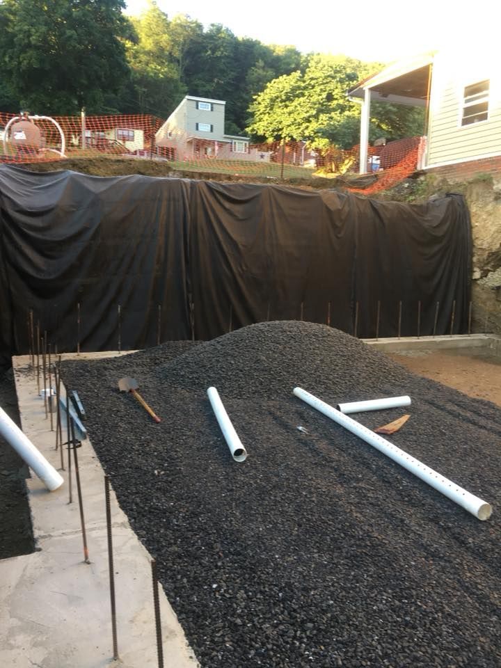 Excavation area secured with protective barrier