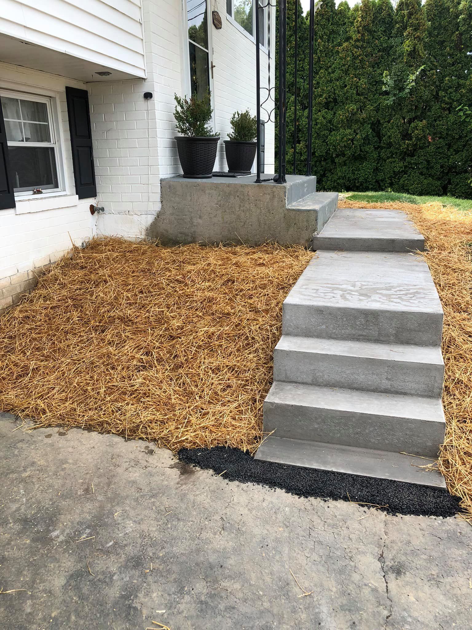 Concrete step and landing installation at home entrance