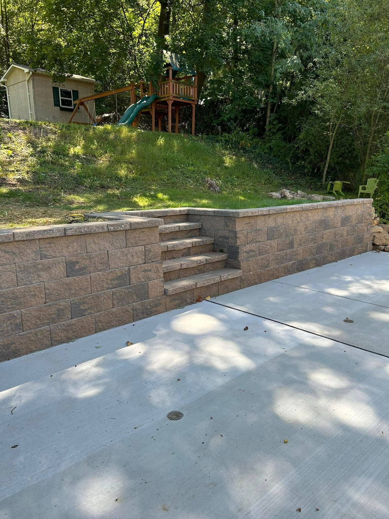 Excavator performing site excavation at residential property