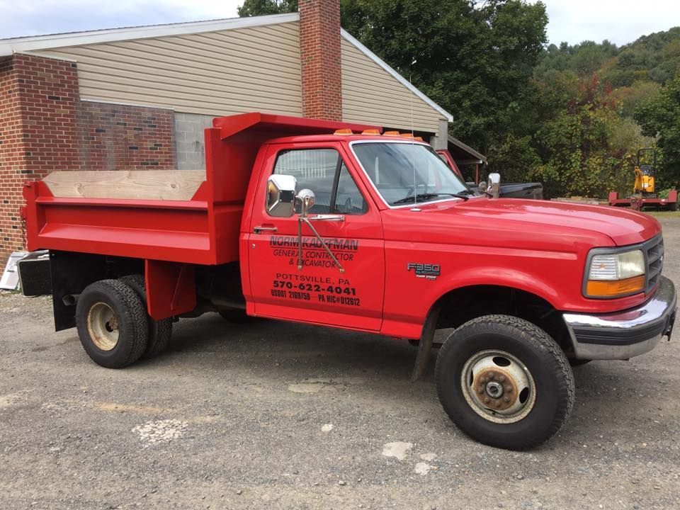 Dump truck used for excavation material transport