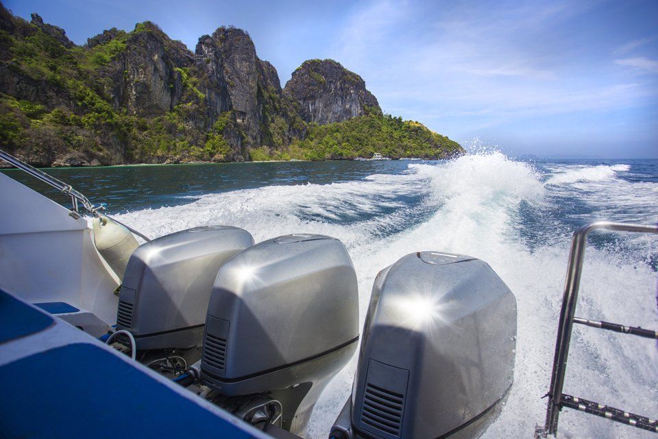 Trace motor boats on the water of a mountain lake