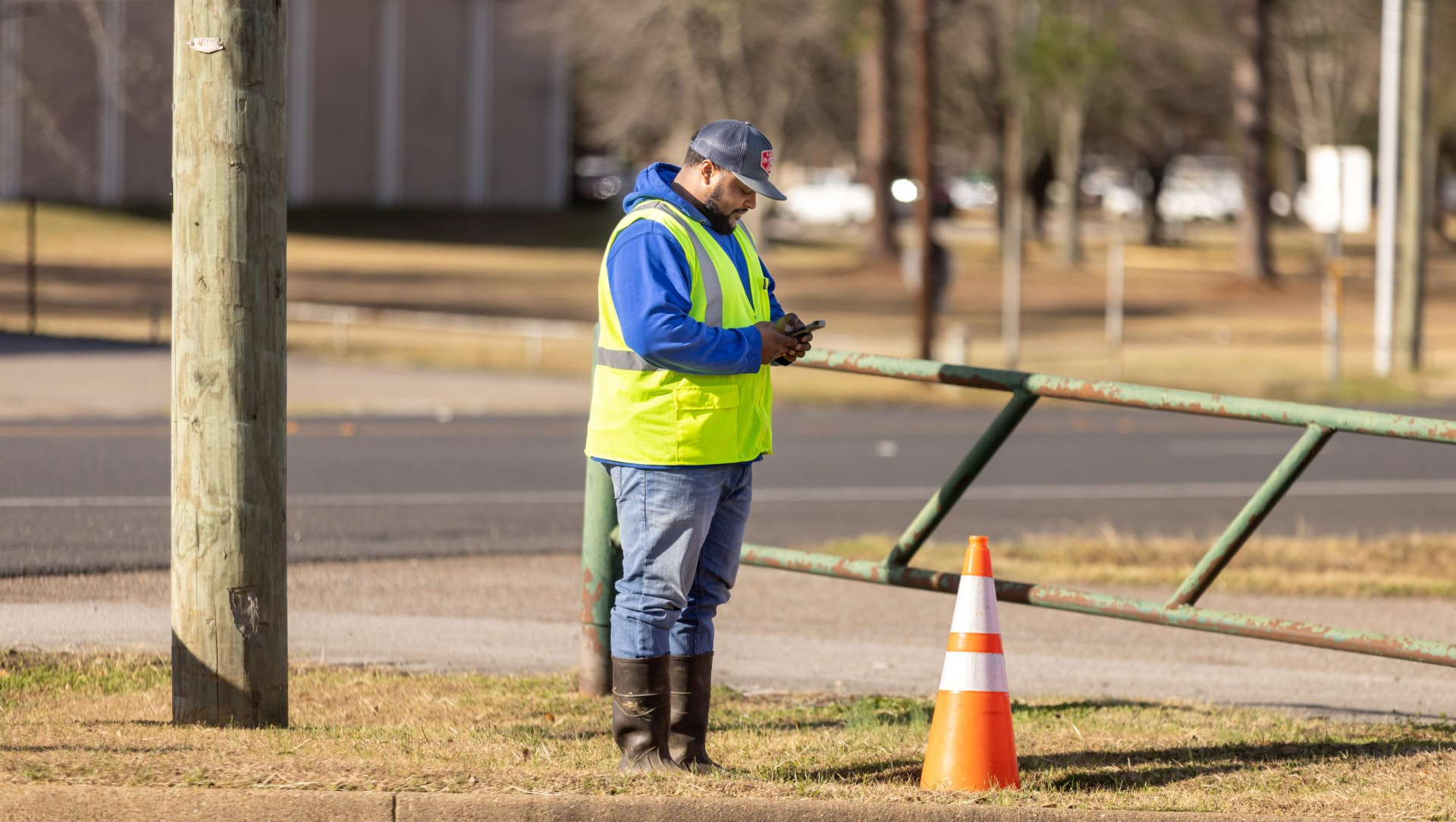 city staff using device to map location