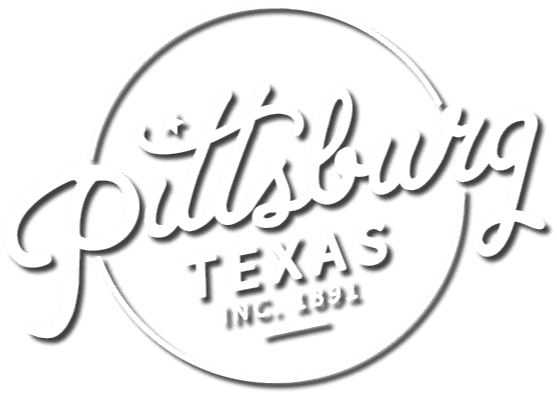 A black and white logo for pittsburg texas inc.