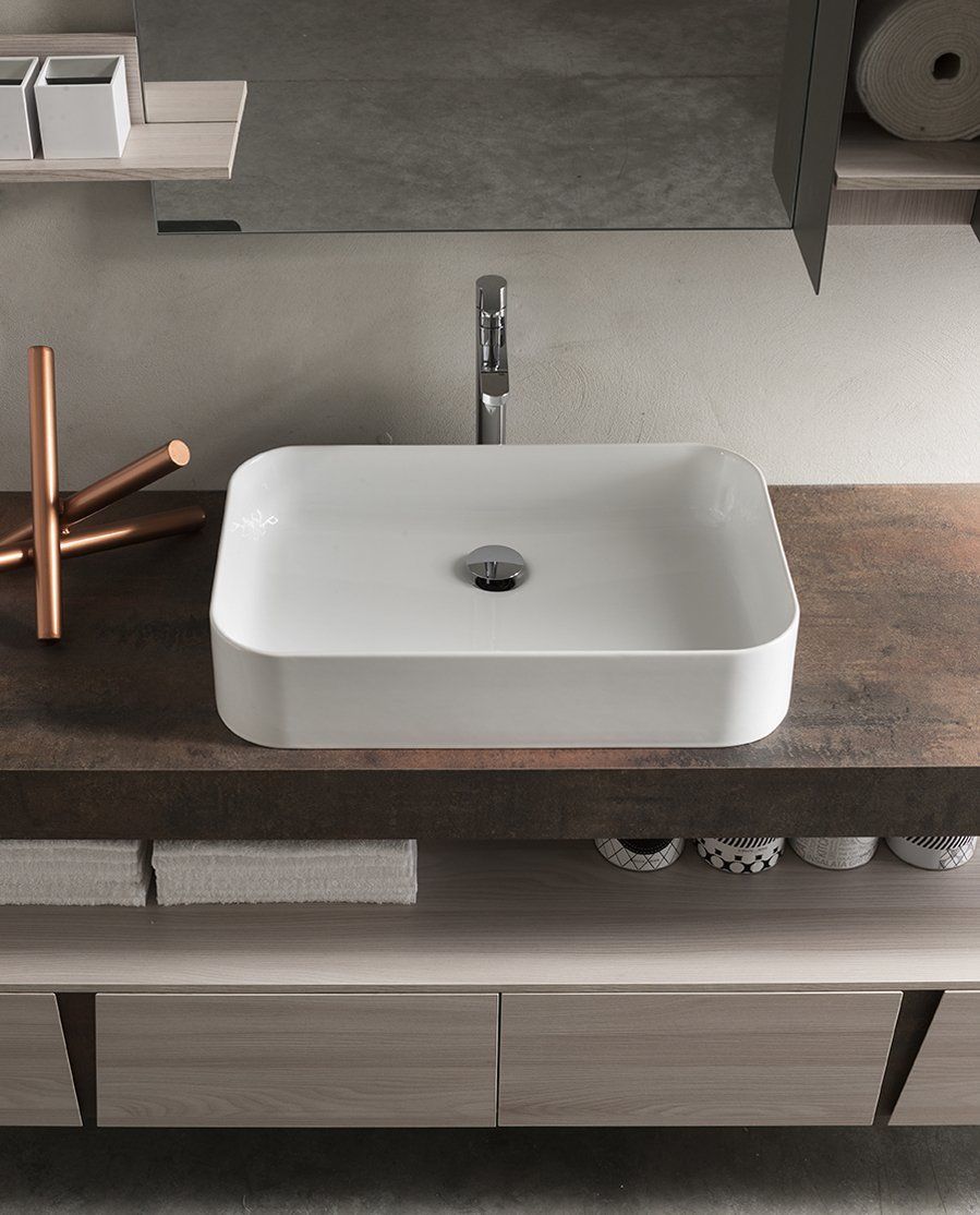 top bagno in HPL corten con sopra lavabo in corian