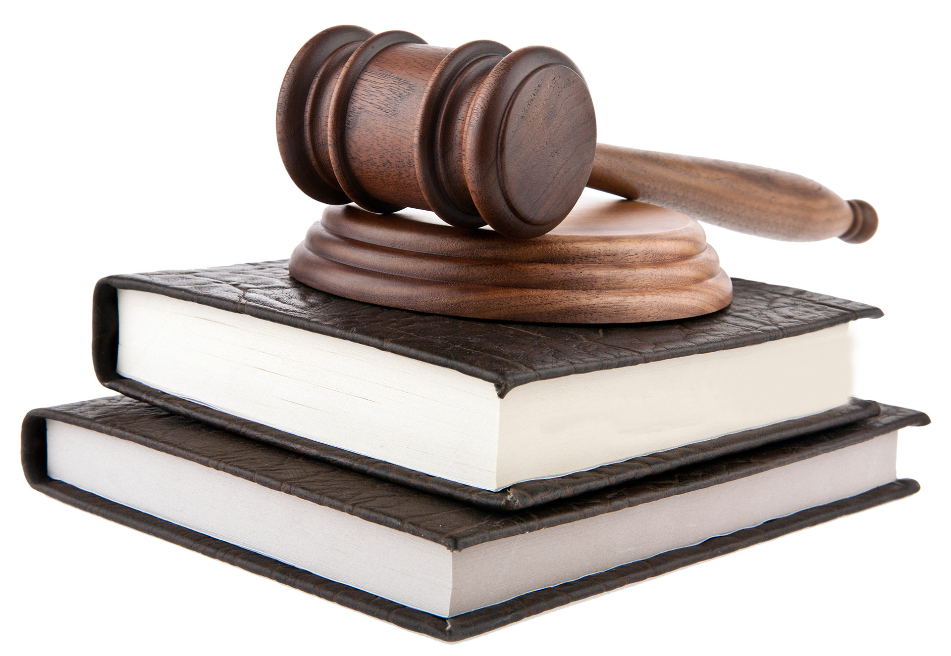 A wooden gavel is sitting on top of a stack of books