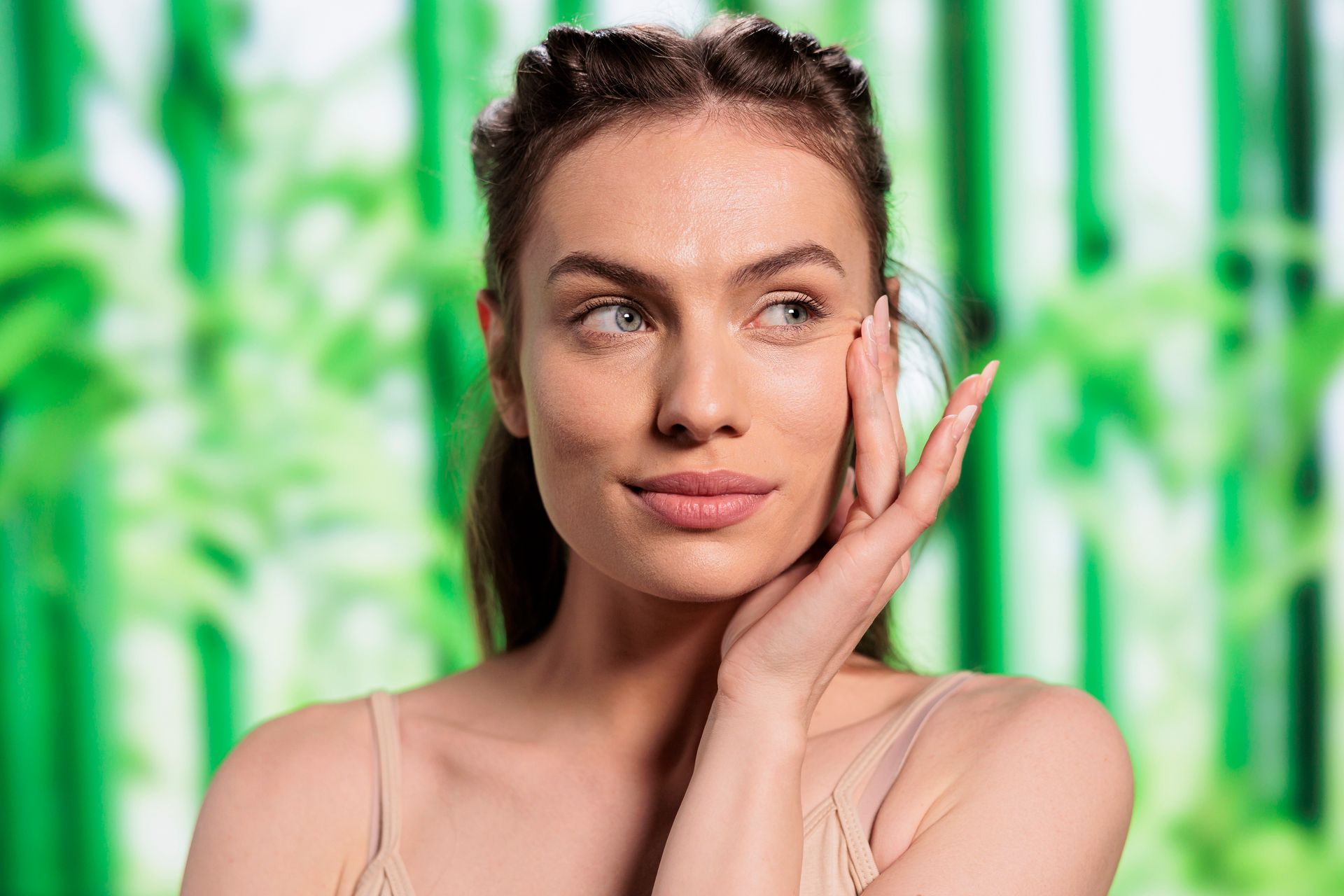 A young woman doing skincare.