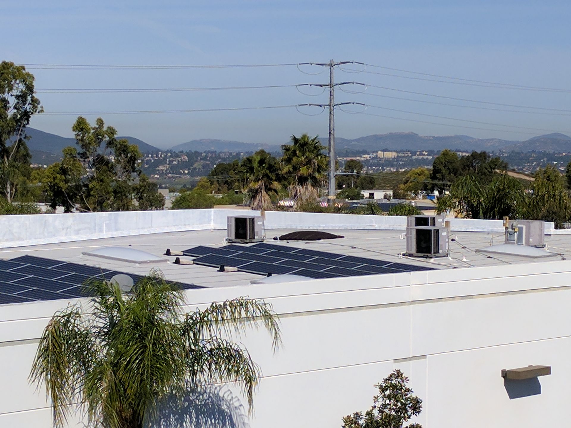 The roof of a building with solar panels on it