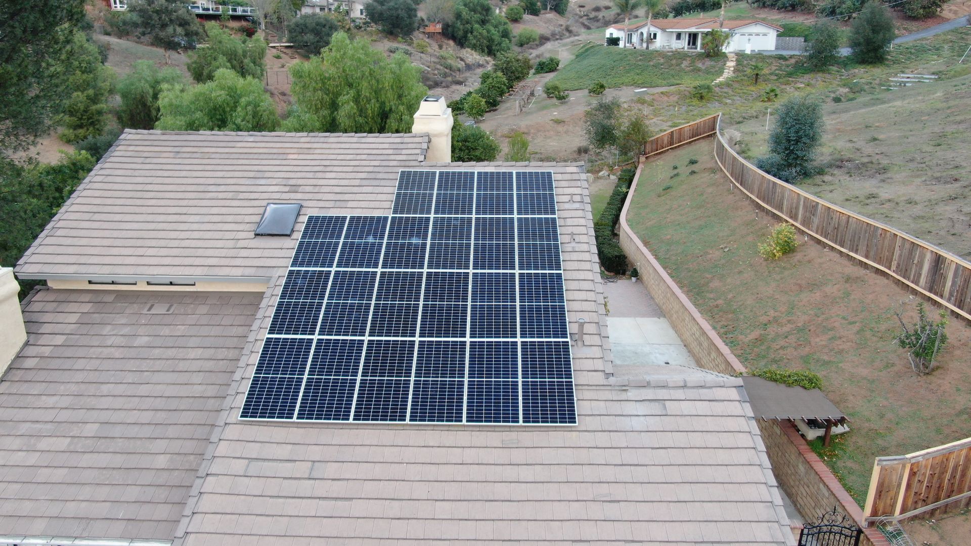 A roof with a lot of solar panels on it