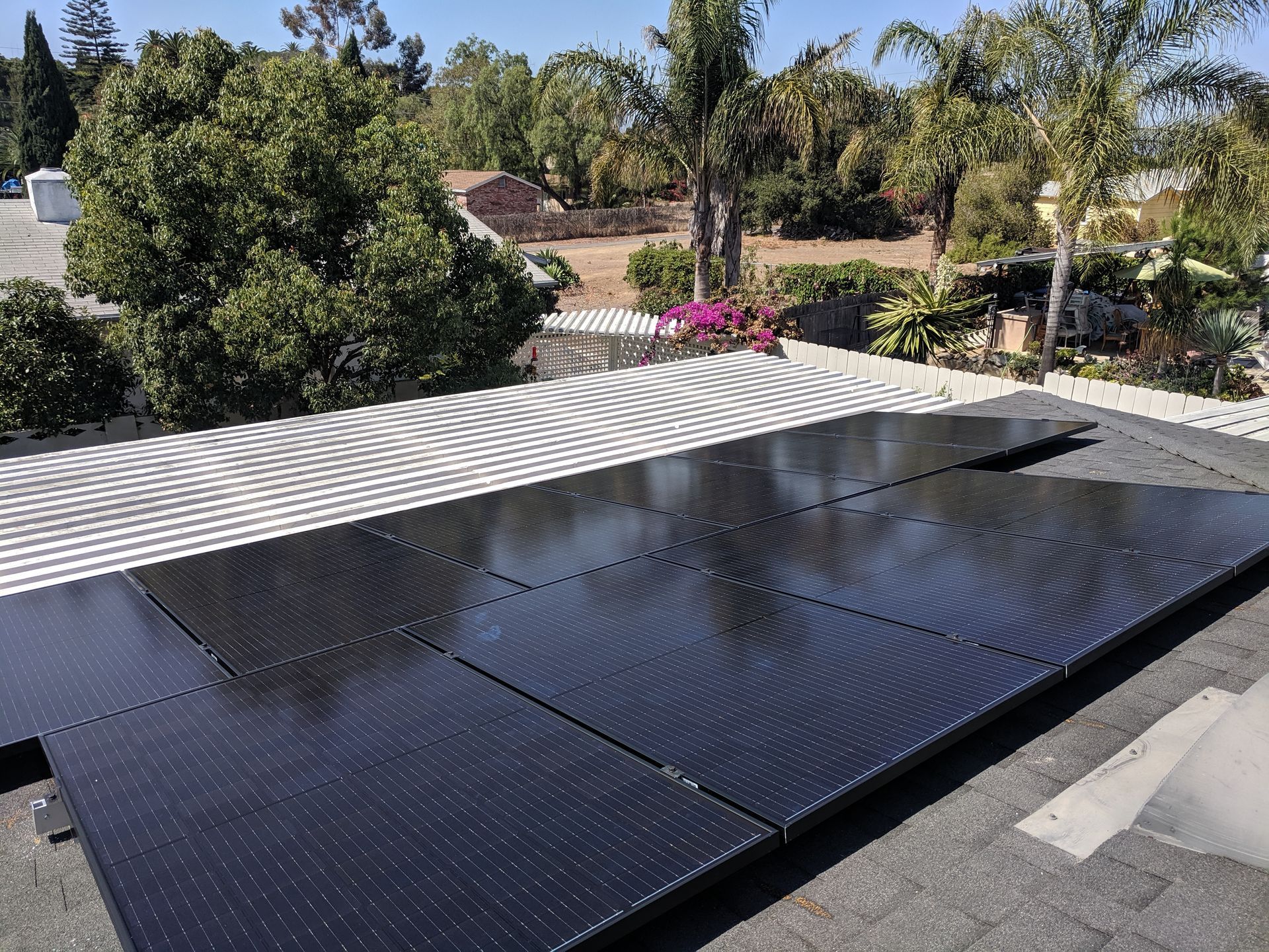 A roof with a lot of solar panels on it