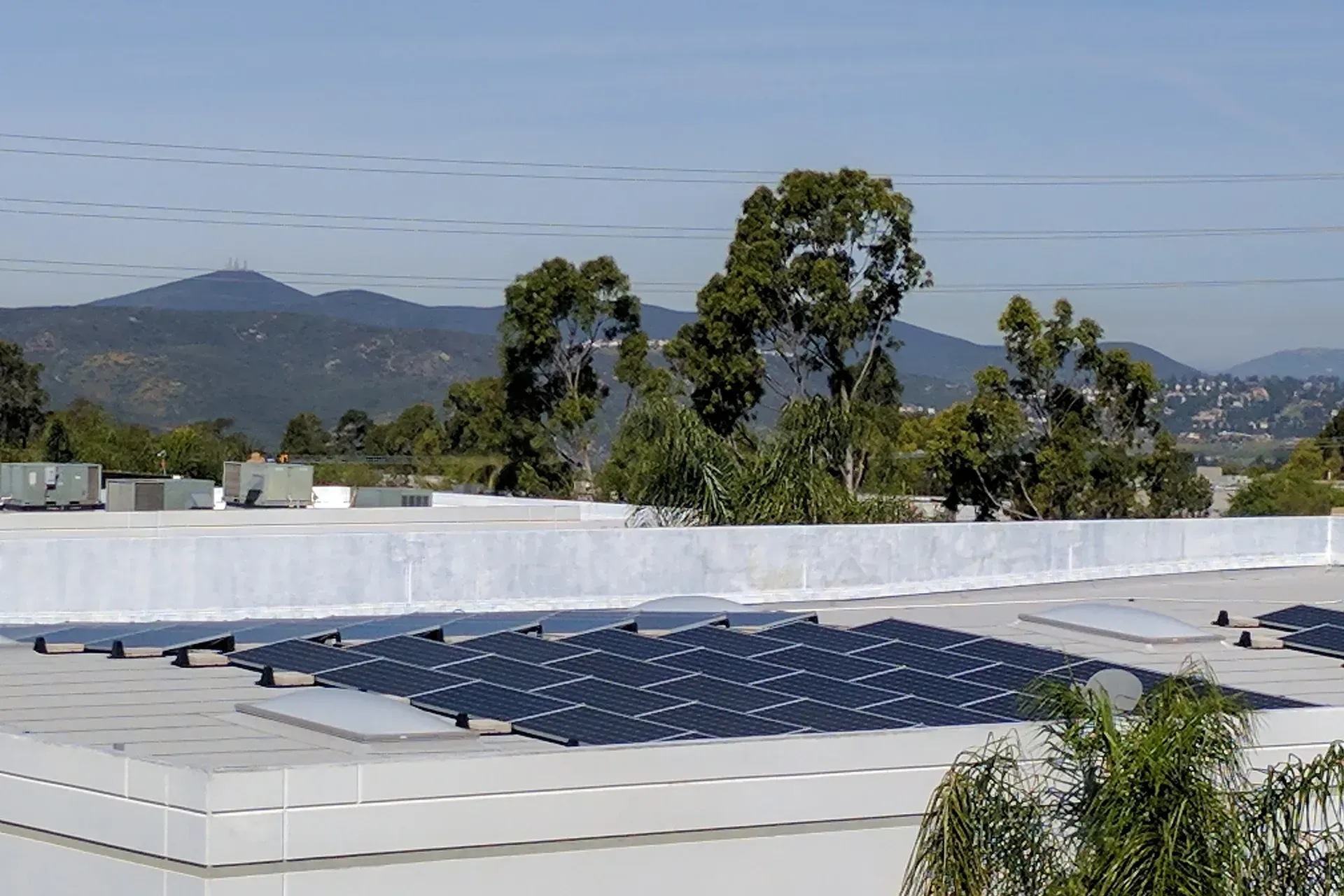 A roof with a lot of solar panels on it