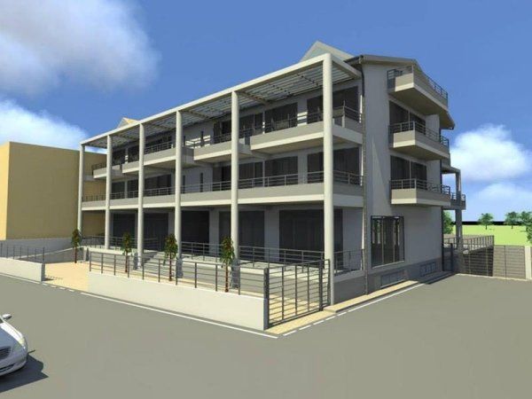 Impressione artistica di un edificio con un'auto parcheggiata di fronte