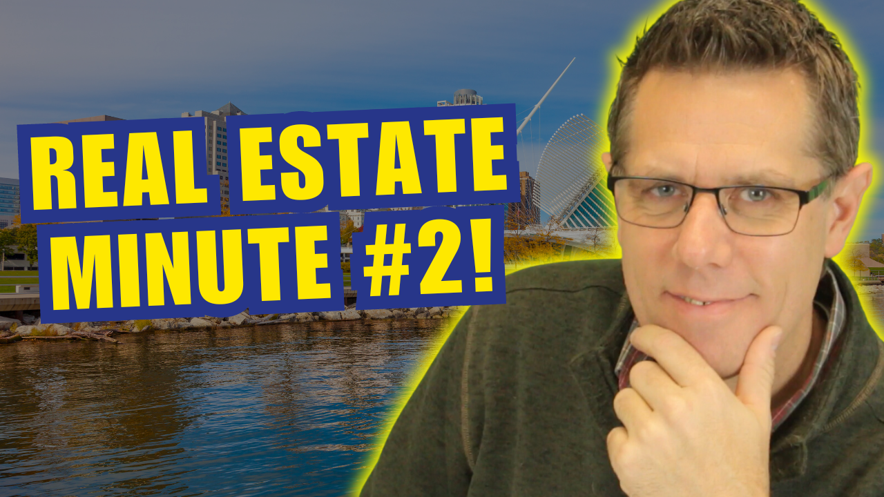 Ben Gohlke from Realty Dynamics is standing in front of a sign that says real estate minute # 2.