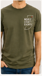Front and back view of 'The Survivor' Noble County Events t-shirt, military green, front features NCE logo, back features humorous text celebrating attending a Noble County event.