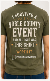 Front and back view of 'The Survivor' Noble County Events t-shirt, military green, front features NCE logo, back features humorous text celebrating attending a Noble County event.