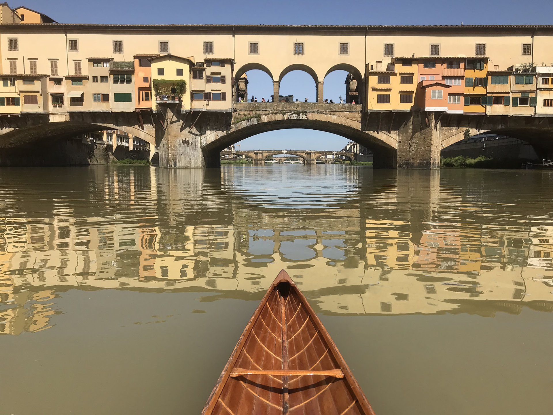 canoe on the Arno with a view of Ponte Vecchio