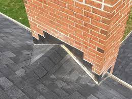 chimney saddle flashing on roof connected to chimney