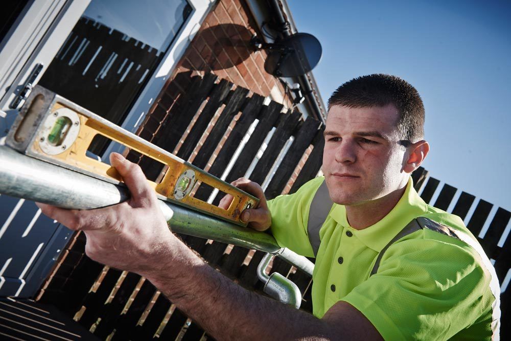 Maintenance and extensions specialist at work in The Wigan Borough
