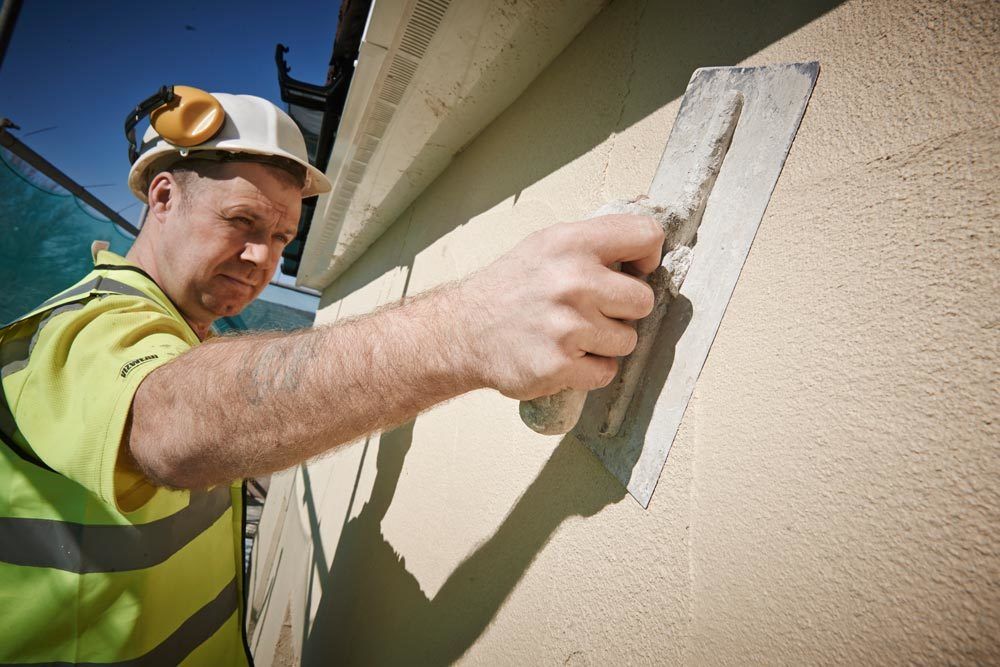 Maintenance and extensions specialist at work in The Wigan Borough