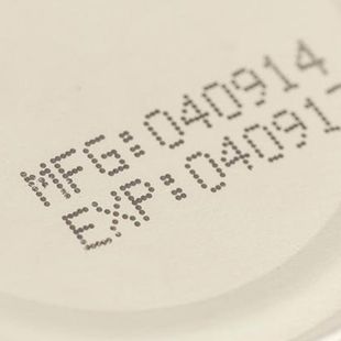 A close up of a label that says expiration date