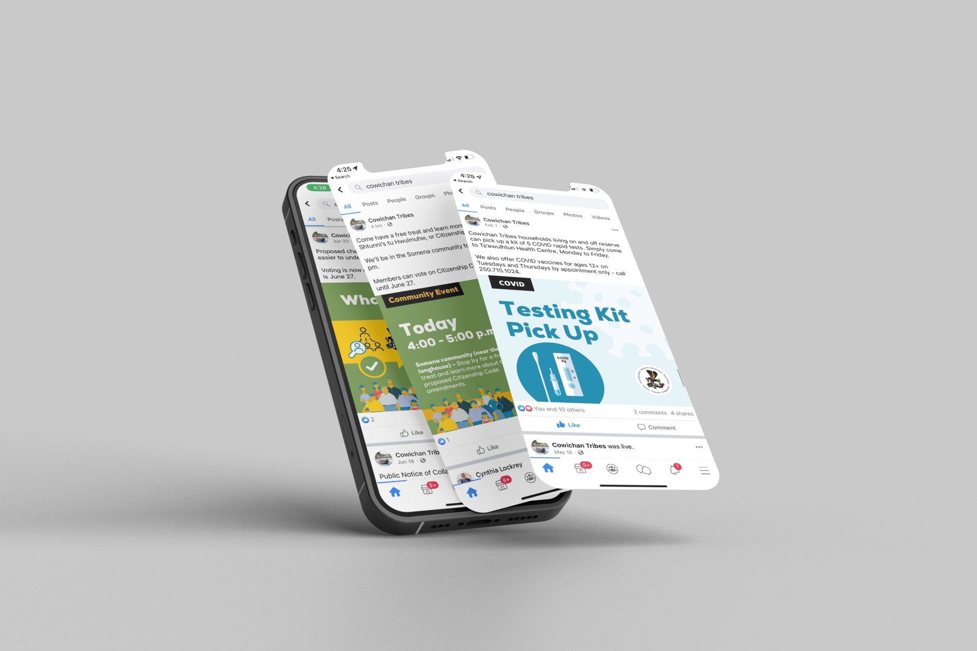 Two cell phones are sitting next to each other on a table.