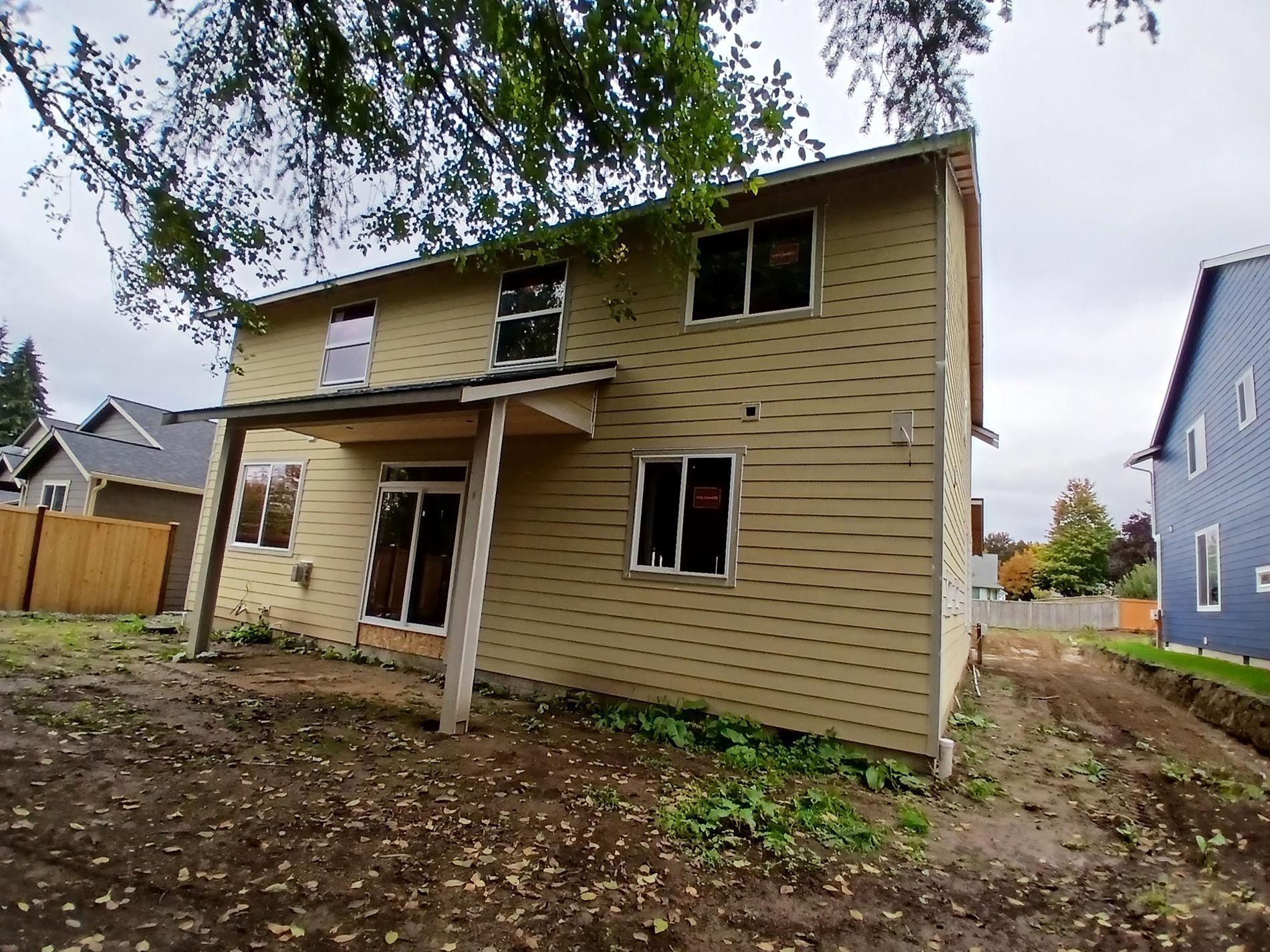 A house with a porch and a lot of windows