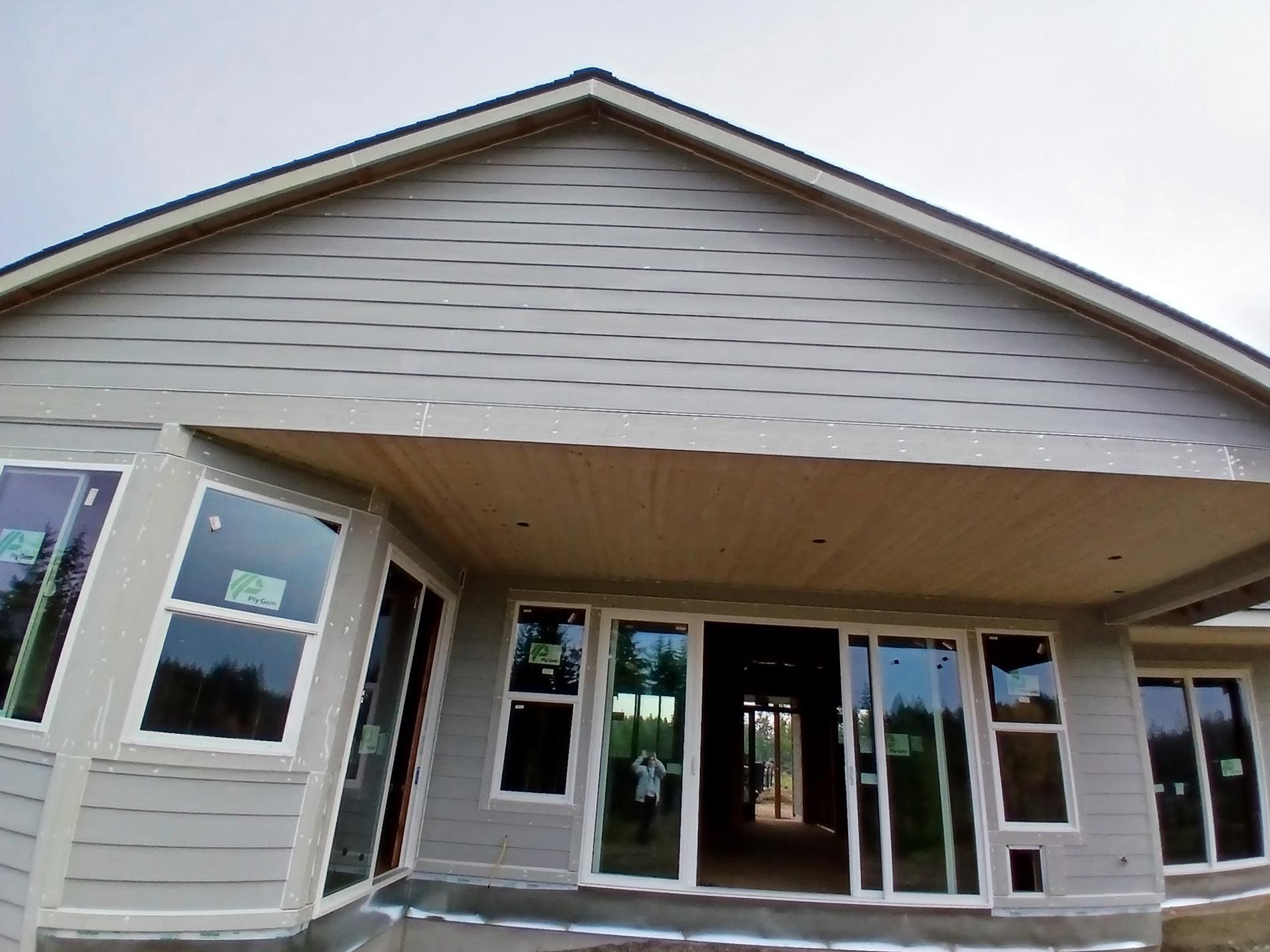 A house with a lot of windows and doors