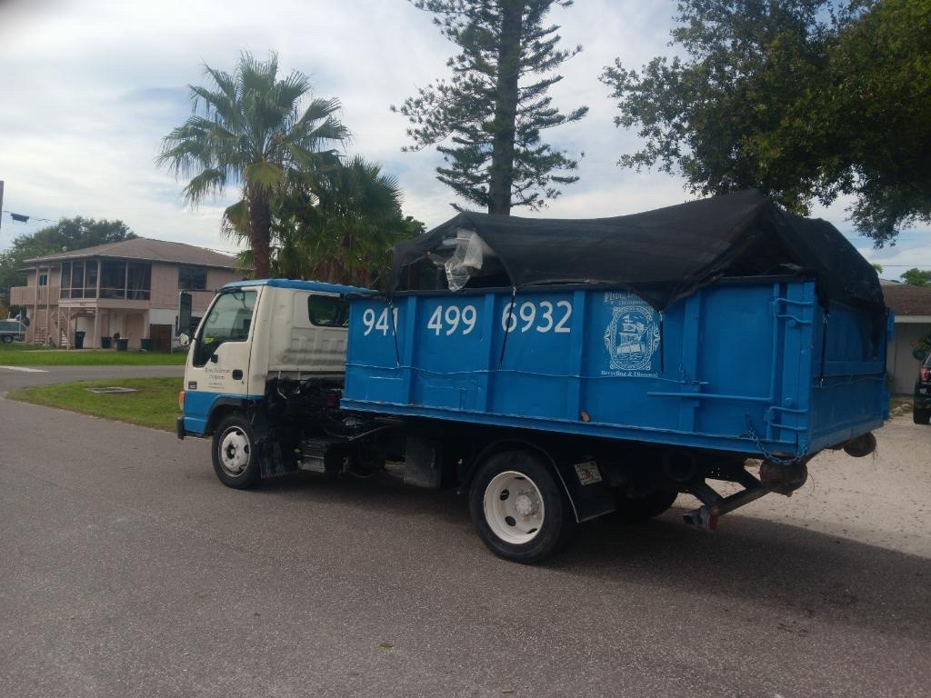 Dumpster Truck — Bradenton, FL — Flying Dutchman Dumpsters